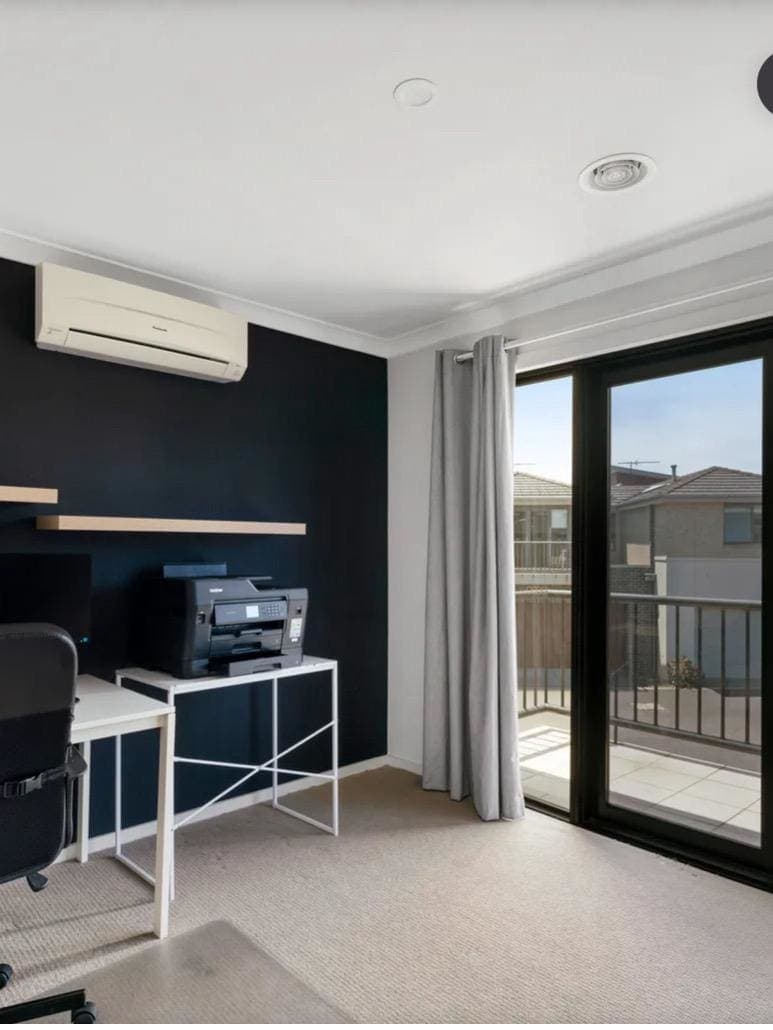 Bedroom with a fresh coat of paint and stylish decor